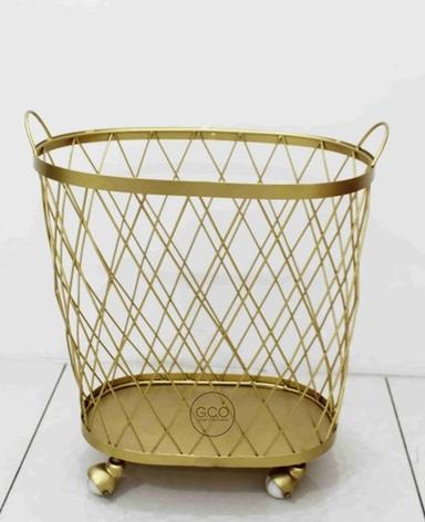 Modish Rotating Basket in iron with golden powder coated finish