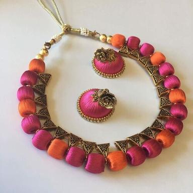 Silk Pendant With Earrings For Party Wear