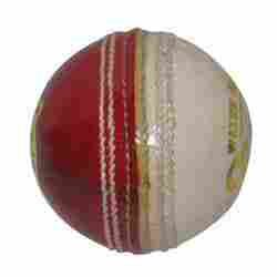 Red And White Cricket Ball