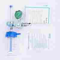 Oxygen flow meter with humidifier bottle