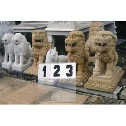White And Brown Sandstone Lions