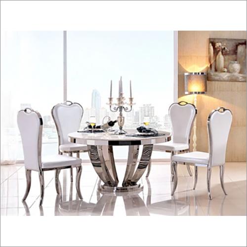 https://www.tradeindia.com/_next/image/?url=https%3A%2F%2Fcpimg.tistatic.com%2F07662712%2Fb%2F4%2FGlass-Top-Dining-Table-With-4-Chair.jpg&w=750&q=75