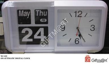White Color Wall Clock Size: 49 X 24 Cm.