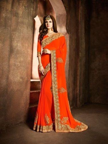 orange designer georgette saree with heavy border