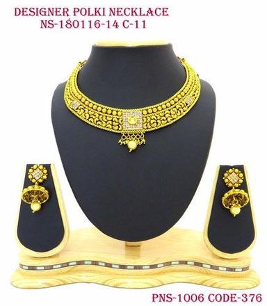 Designer Polki Antique Gold Necklace  Pendant Earrings