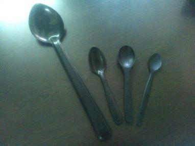 Black And Silver Conductive Spoons