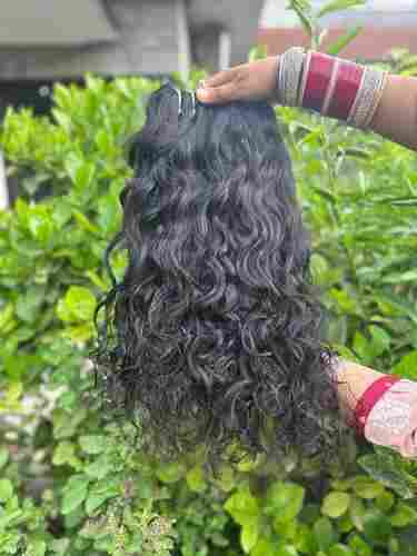 Unprocessed curly human hair extensions
