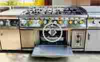 STAINLESS STEEL SIX BURNER RANGE WITH OVEN