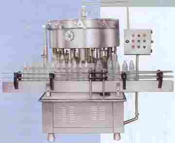 SEMI AUTOMATIC ROTARY COUNTER PRESSURE FILLING WITH LOADING & UNLOADING