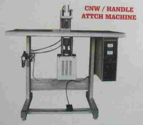 Cnw/Handle Attch Machine