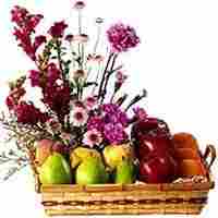 Fresh Fruits Basket With Exotic Colourfull Flowers