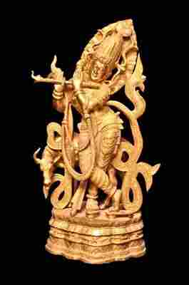 Brass ornamented Krishna sculpture
