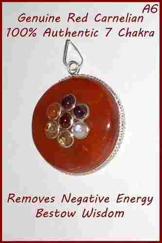 Red carnelian round shape pendant with chakra gem stones embedded