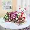 Orchids Bouquet with Half Kg Black Forest Cake and a Teddy Bear
