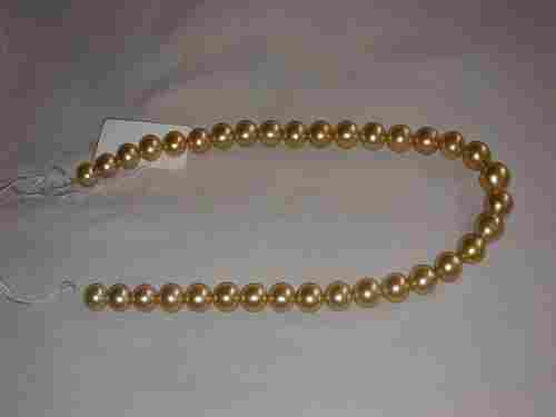 Fancy Golden Pearls Necklaces
