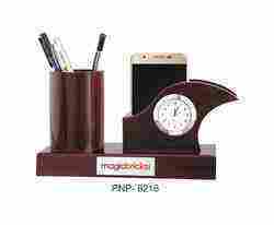 Clock With Pen And Mobile Holder