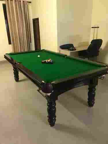 Green and Black Pool Table