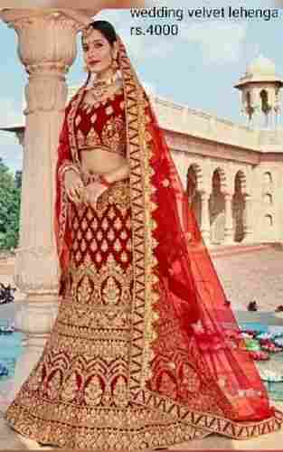 Beautiful And Gorgeous Red And Golden Smart Fit Skin Friendly Ladies Designer Embroidered Velvet Bridal Lehenga Choli