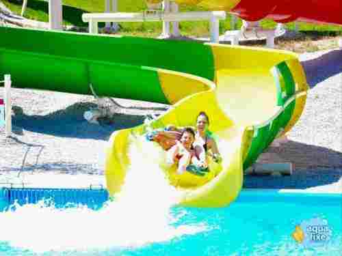 Green and Yellow Color Open Float Slide, Rider Capacity 120 to 240 Person/Hour