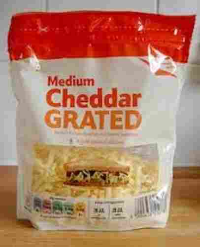 Healthy And Nutritious Salty And Creamy In Taste Medium Cheddar Grated Thin Slices Cheese