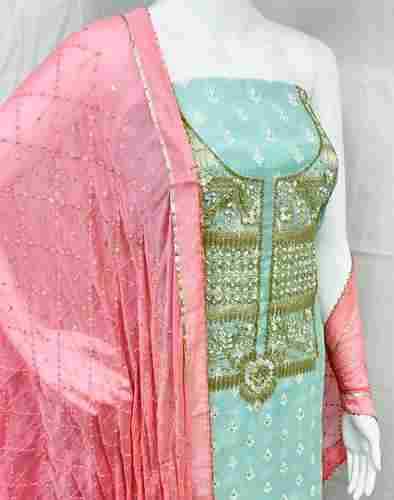 Unstitched Ladies Silk Green Salwar Suit With Pink Dupatta Neck Hand Embroidery Neck Design