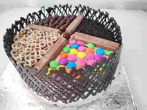 Tasty And Mouth Melting Chocolate Cake Topping With Gems And Roll Stick, Delicious In Taste