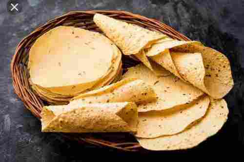 Round Shape Yellow Flavoured Garlic Papad Use As Cooking And Snacks