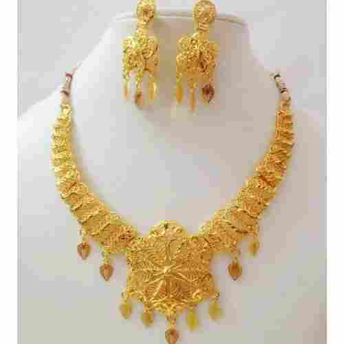 Gold Forming Necklace Set With Earrings For Party And Wedding Wear