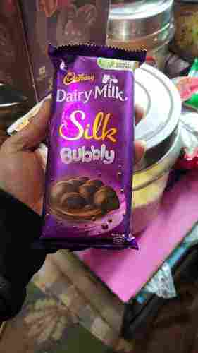 Tasty Delicious Mouth Melting Brown Color Cadbury Dairy Milk Silk Bubbly Chocolate