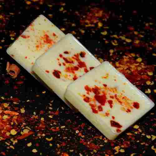 Rich Delicious Natural Fine Taste White Color Red Chilli Flavoured Homemade Chocolate