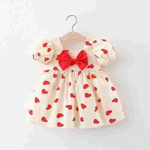 Attractive White And Red Color Heart Printed Baby Frocks For Daily Wear 