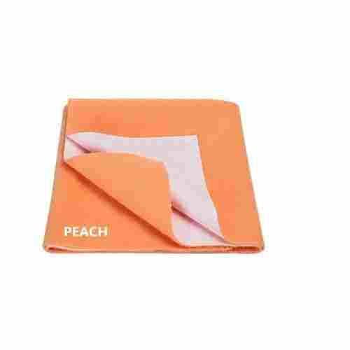 Reusable Peach Waterproof Skin Friendly PVC Baby Dry Bed Protector Sheet For Home
