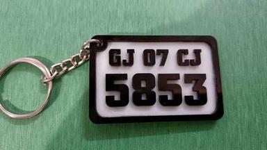 Plastic Black And White Printed Numbering Key Chains Made With Premium Quality