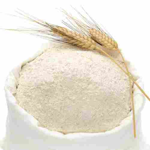 High In Carbs Ground Processed Premium Grade White Sharbati Wheat Flour , 25 Kgs