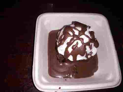 Delicious and Sweet Taste Vanilla Ice Cream With Added Chocolate Syrup