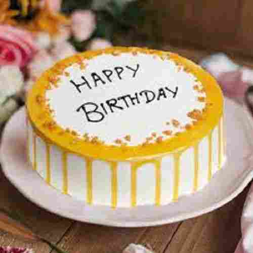 Beautiful Fresh Baked Decorated Designer Yellow And White Sweet Birthday Cake