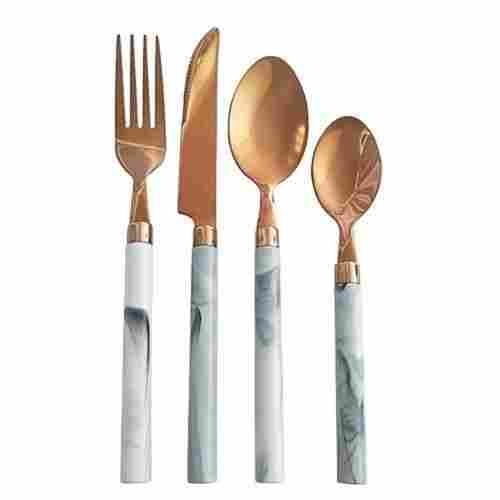 Copper Cutlery Setthis Set Includes A Spoon, Fork, And Knife, All Of Which Are Made Of Stainless Steel With A Copper Finish.