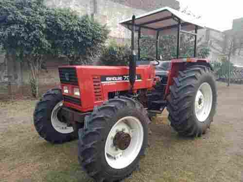High Performance Heavy Duty And Long Durable 4 Wheeler Red Holland Tractor