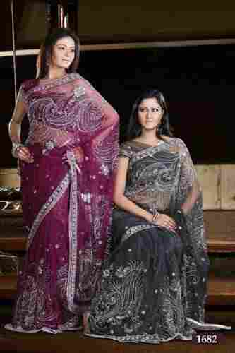 Ladies Light Weighted Party Wear Purple And Black Stone Work Net Saree