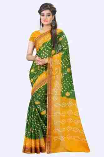 Beautifully Designed Yellow And Green Bandhani Style Lace Border Work Saree For Women