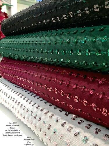 Embroidery Sequins Fabric For Making Garments With 100-150 Gsm  Texture: Embroidered