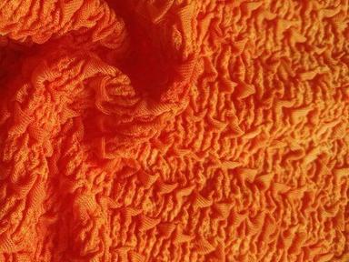 Export Quality Orange Knitted Fabrics For Garments And Home Furnishing