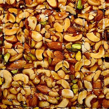 Crispy And Delicious Sweet Dry Fruit Chikki With Six Months Shelf Life  Carbohydrate: 9 Grams (G)