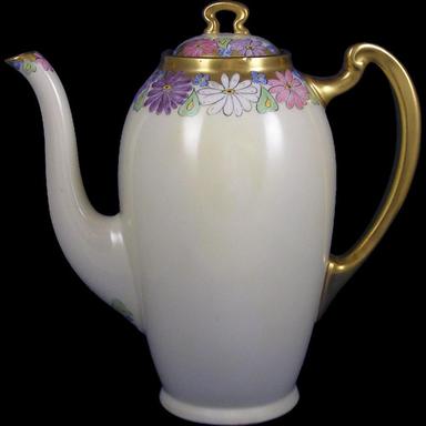 enameled floral motif coffee pot