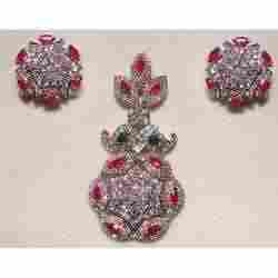 Diamond Pendants Sets with ruby and emb.