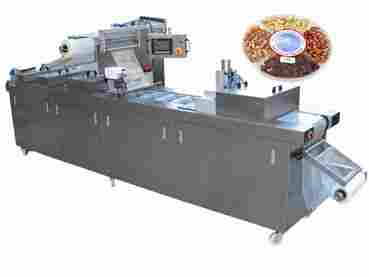 Snack/Donut/Lunch Box Auto Thermoforming Vacuum Packaging Machine