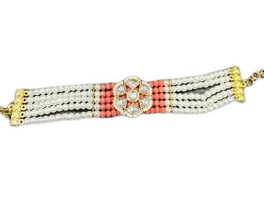 White and Orange Pearl and Brass Metal Bracelet