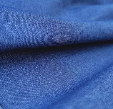  जींस और अन्य प्रकार के कपड़ों के लिए इस्तेमाल किया जाने वाला नीला कॉटन डेनिम फ़ैब्रिक फ़ैब्रिक क्षमता: 130 ग्राम 