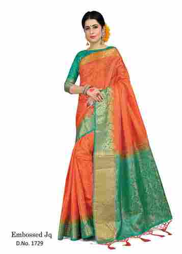 Exclusive Orange And Green Color Embossed Jacquard Saree