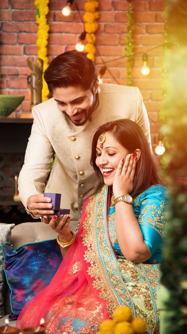Sibling Together Celebrating Diwali With Holding A Plate Of Diyas High-Res  Stock Photo - Getty Images